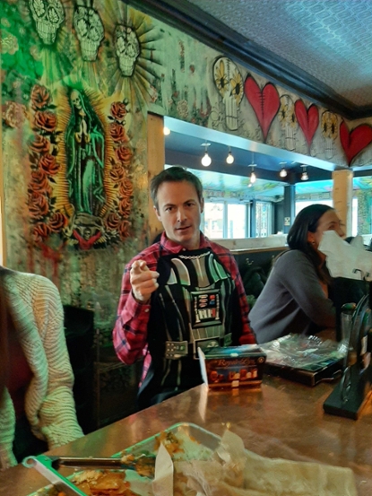 Dr. Joanisse enjoys his Christmas present: a Darth Vader apron